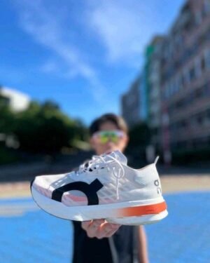 ON RUNNING CLOUD BOOM WHITE ORANGE